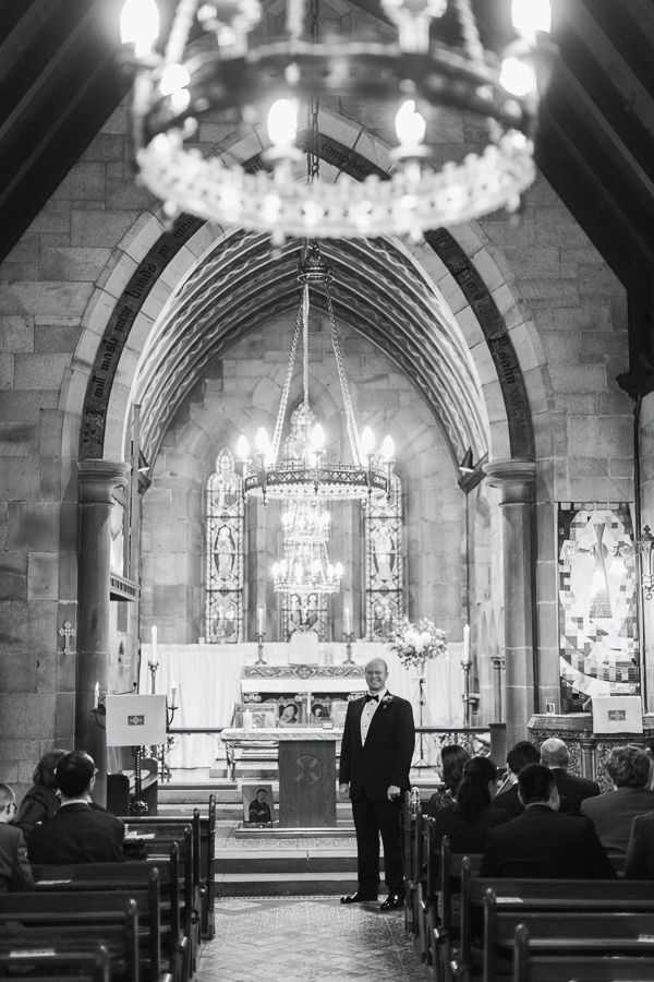 small country church in scotland wedding groom waiting at the altar