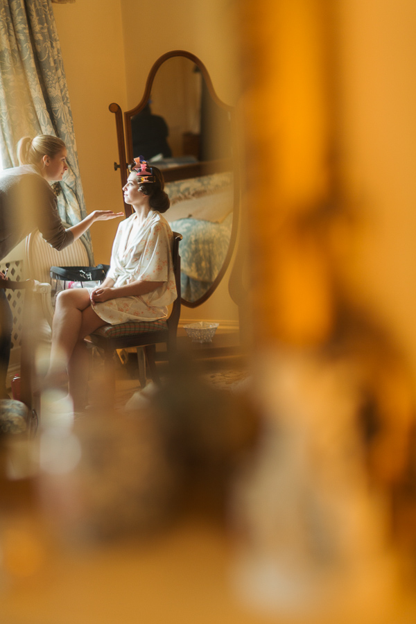 bride having her makeup done at dundas castle scottish wedding venue