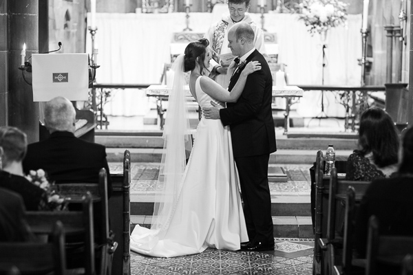bride and groom looking at each other