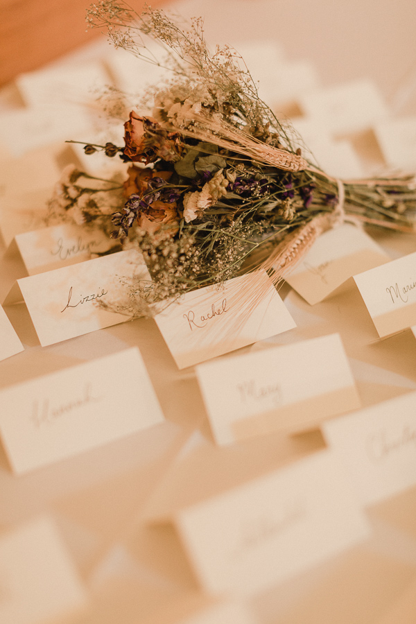 flowers between name tags