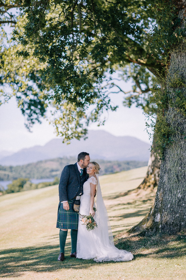 a couple photographed by loch lomond 