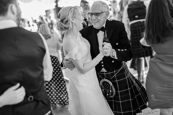 granddauther and grandfather at the wedding loch lomond 