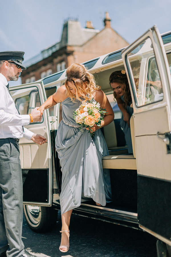 bridesmaids getting our of the car 