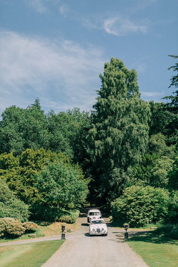 wedding cars arriving at the boturich castle 