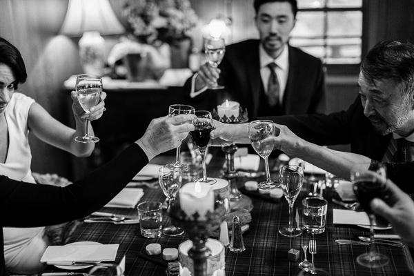 guests cheering inside tree hosue loch goil wedding