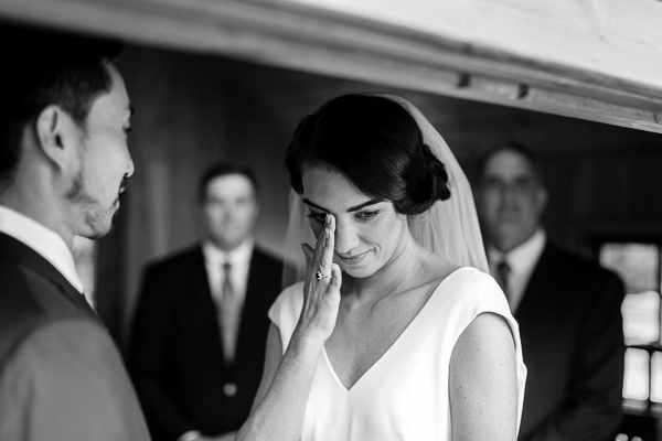 bride emotional during ceremony