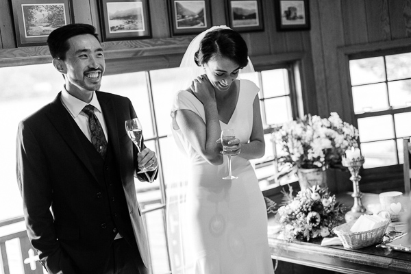 bride and groom laughing after ceremony