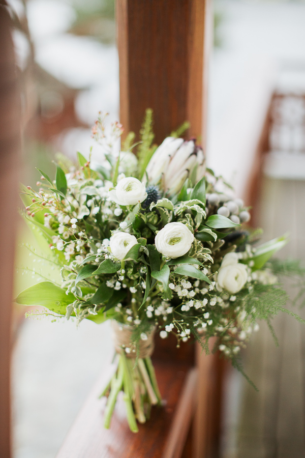white and green wedding flowers on balcony at the lodeg scotland