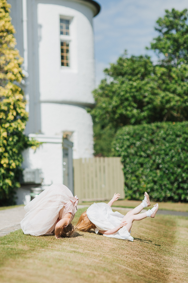flower girls playing in the garden