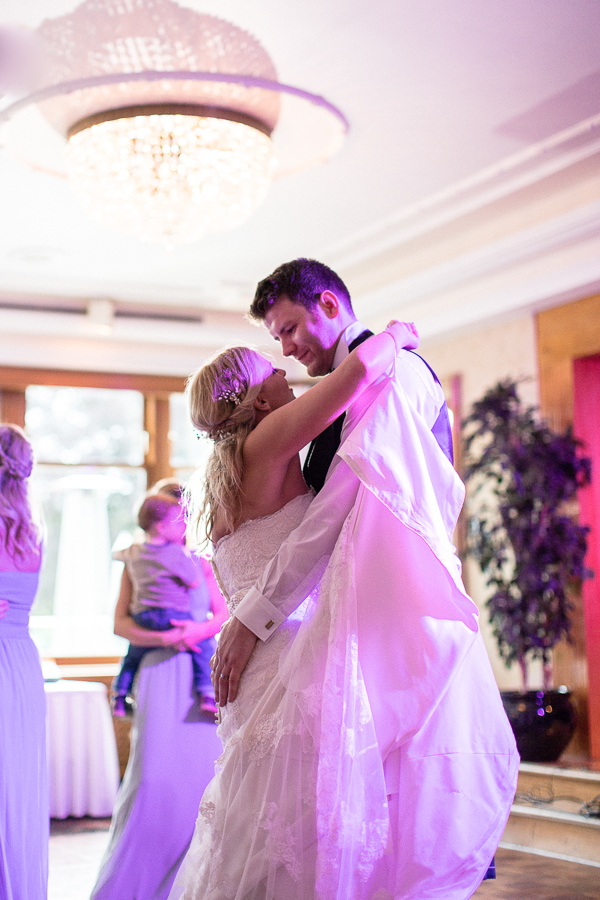 first dance bride and groom embraced