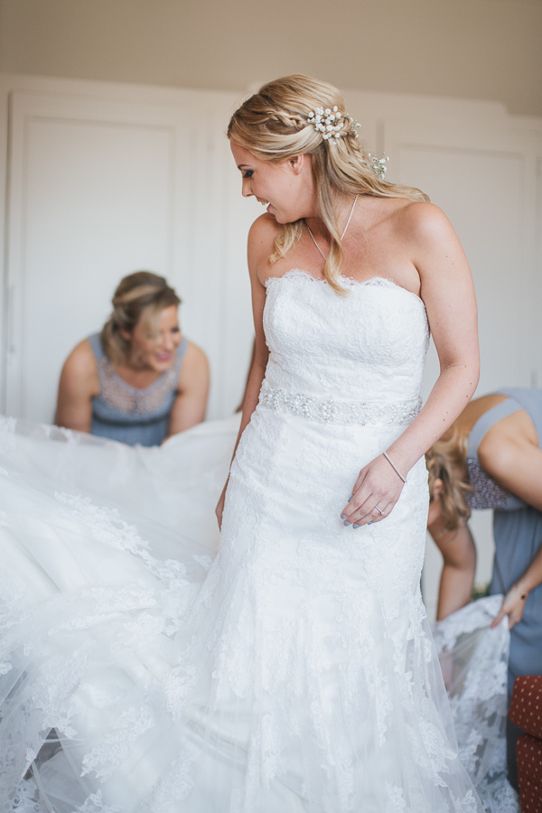 bridesmates fixing bride