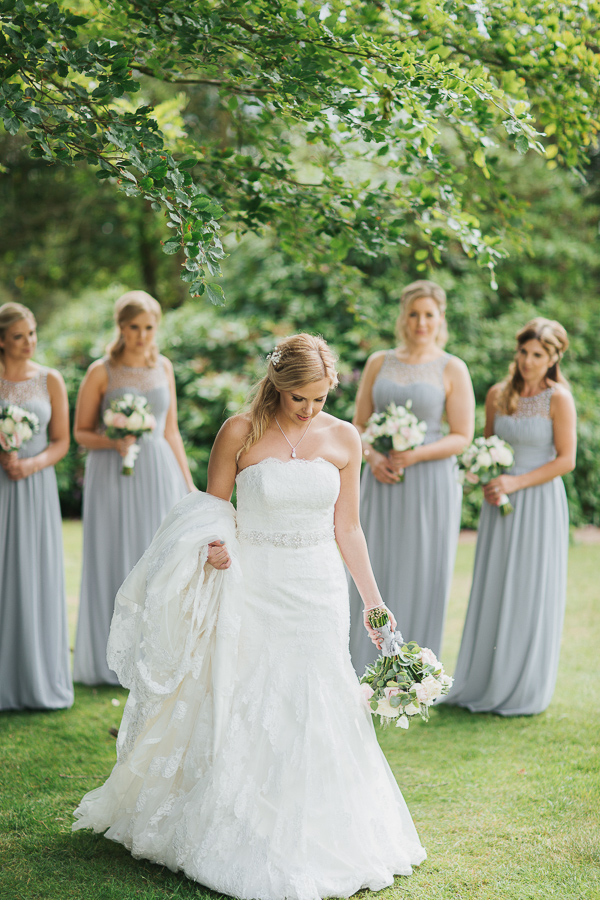 bride walking away at the garden