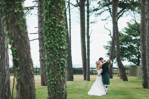 newlyweds embraced in the garden