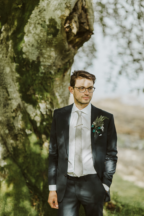 a portrait of the groom at the lodge on loch goil