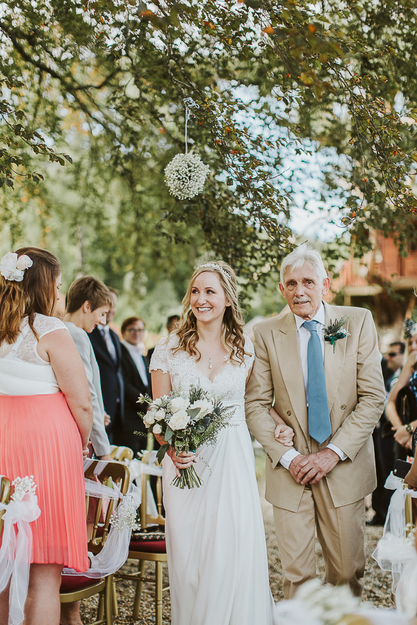 bride walking down with dad at wedding at the lodge on loch goil by fotogenic of scotland