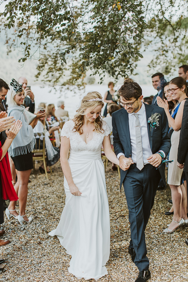 newlyweds walking down the aisle