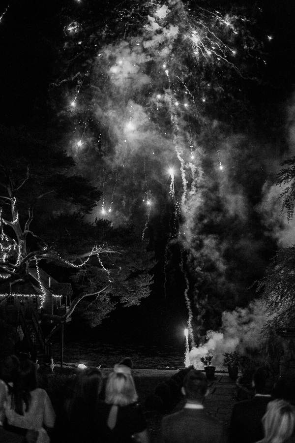 fireworks next to tree house at the lodge on loch goil in scotland