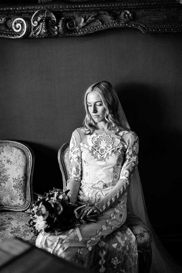 newlywed girl looking at flowers