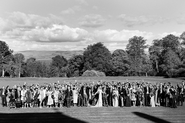 group photo on lawn at scottish wedding