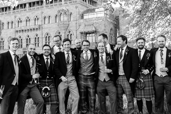 groom with friends at wedding venue