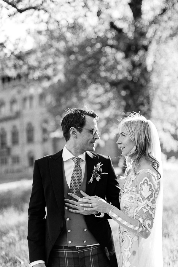 just married couple at mount stuart holding hands
