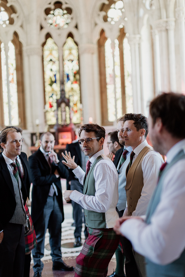 groom with groomsmen at chapel 