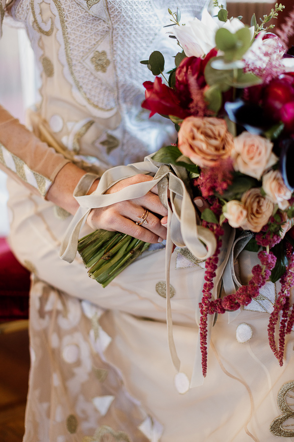 egagement ring with flowers on bride