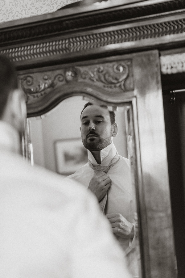 Groom getting ready at Glenapp Castle Scotland