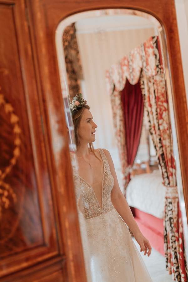 beautiful bride in the mirror at the wedding in Glenapp Castle