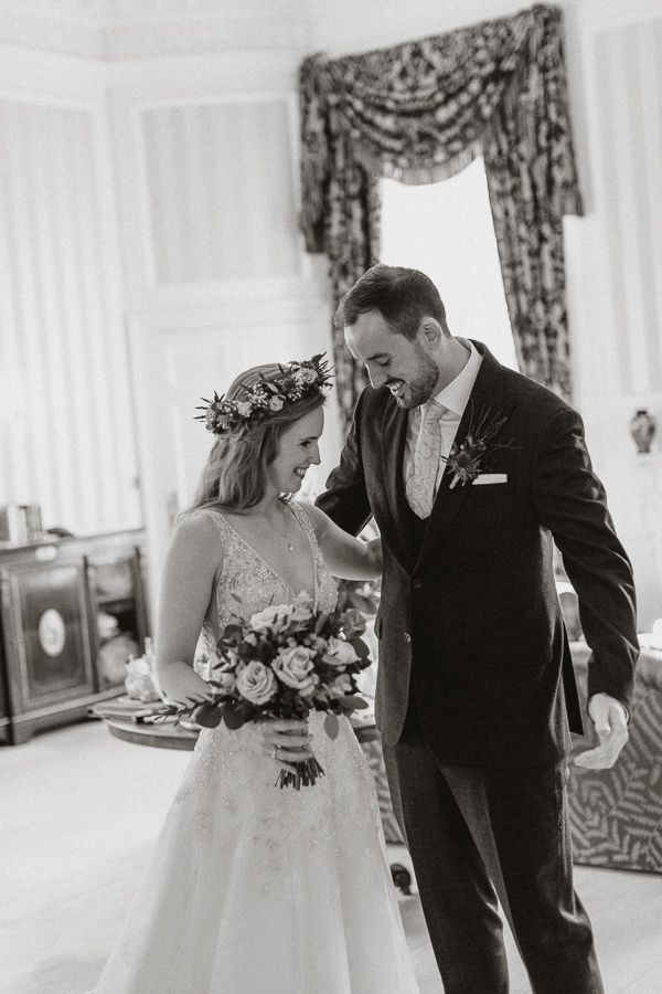 bride and groom happy at the frist glance at Glenapp Wedding Venue