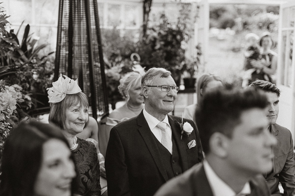grooms parents happy at hte humanist ceremony in Glenapp Greenhouse