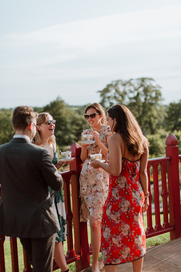 welcome party at dumfries house guests laughing