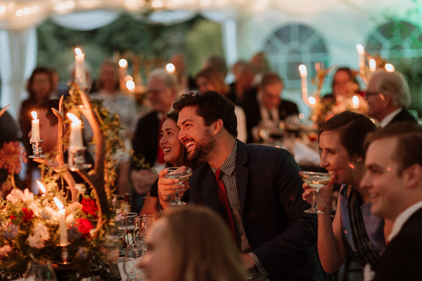 guests during speeches laughing at soarn castle scottish wedding venue