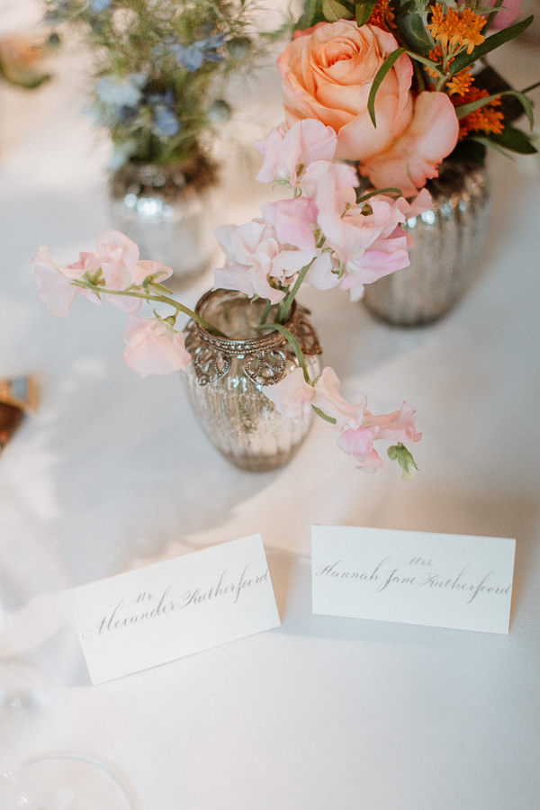 flowers and name cards at dumfries house wedding