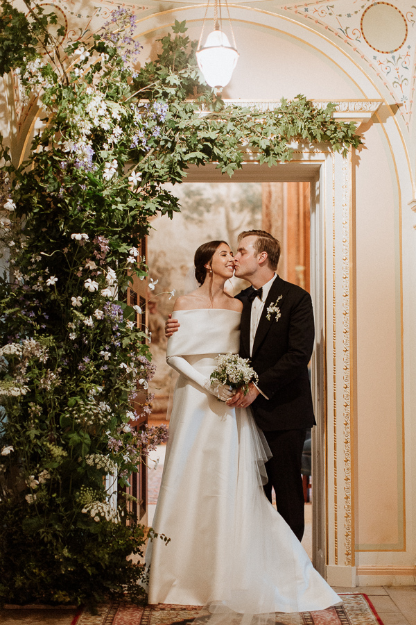 Dumfries House Wedding Photos bride and groom kissing by the door