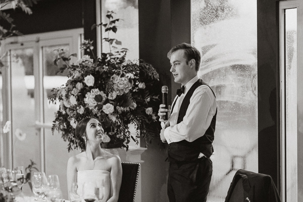 groom giving a speech during wedding 