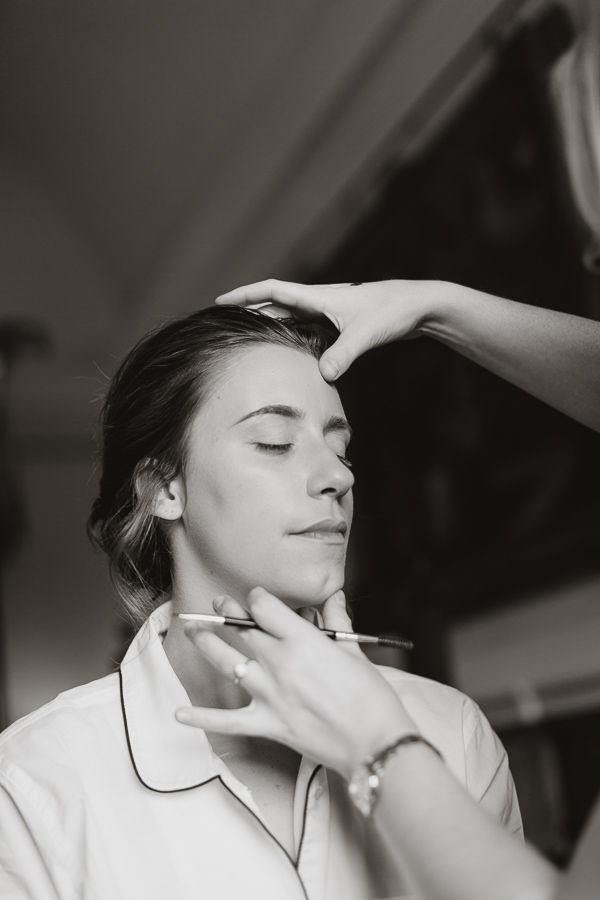 bridesmate getting her makeup done