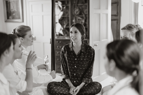 bride talking to her bridesmates