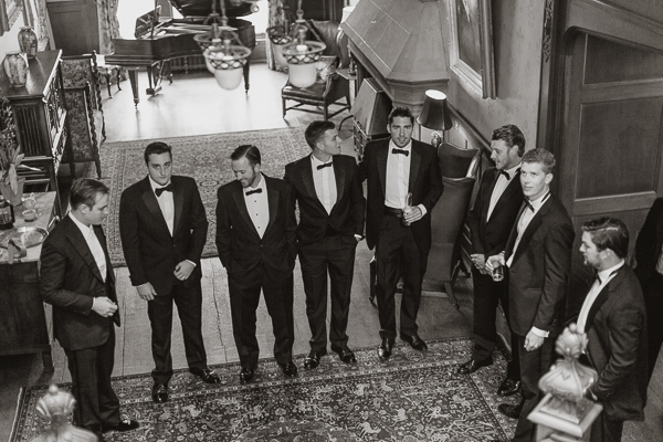 all groomsmen with groom in toxidos