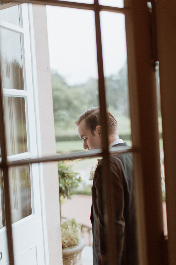 groom entering dumfries house
