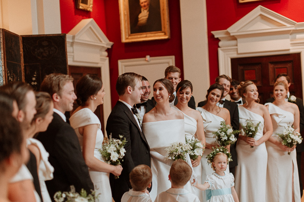 bridal party bride and groom looking at each other