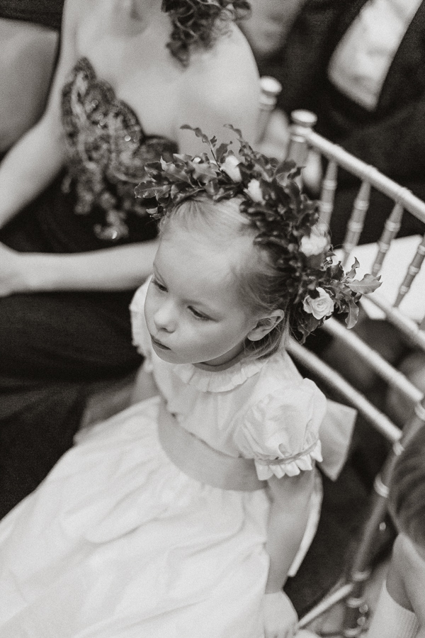 flowers girl sitting at ceremony