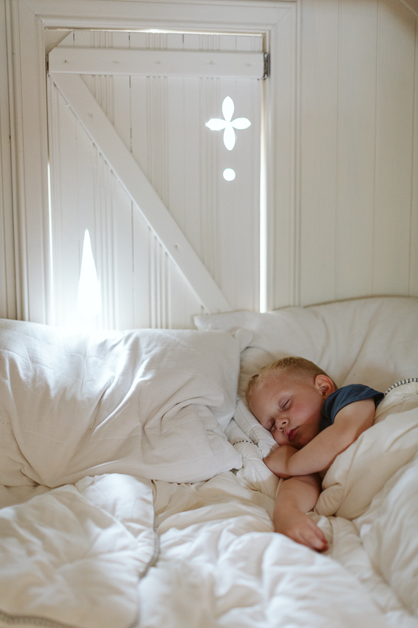 child sleeping in the summer house on the wedding day scotland 